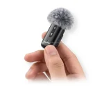 Neepho NP-63 wireless mic held in hand to show its mini size